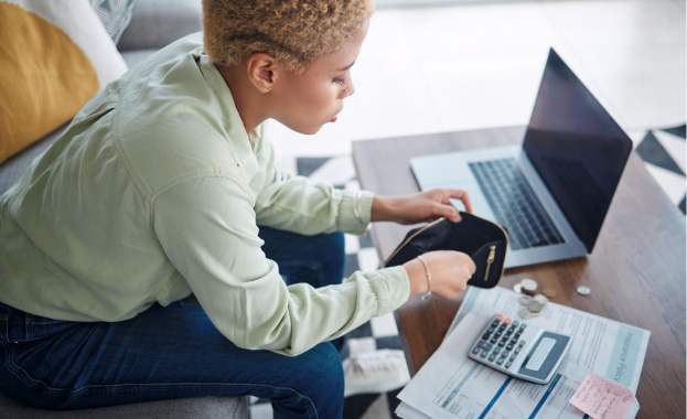 Money and a payment terminal, representing flexible payment plans for commercial auto insurance.